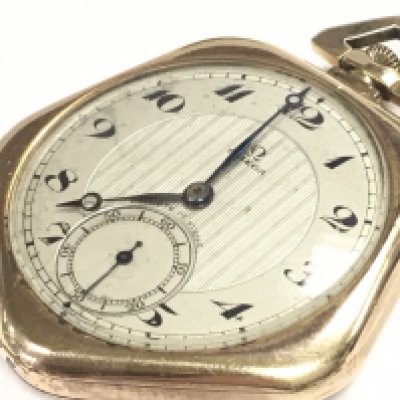 A gold plated Omega pocket watch