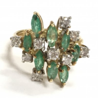 A high carat gold emerald and diamond ring , size L/M. Postage category A