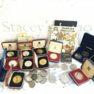 A collection of silver and other coinage including isle of man coins and a box of rolled sealed 1971 1p coins. Postage B