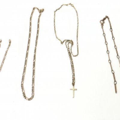 A collection of four 9ct gold chains. 21.51g total. One chain A/F Postage A