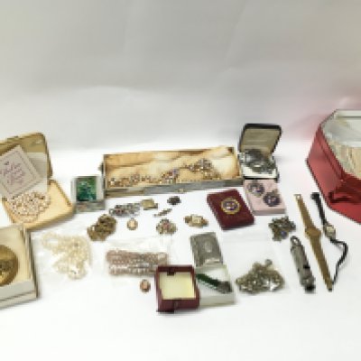 A collection of assorted costume jewellery including a small 9ct gold cameo. Postage B