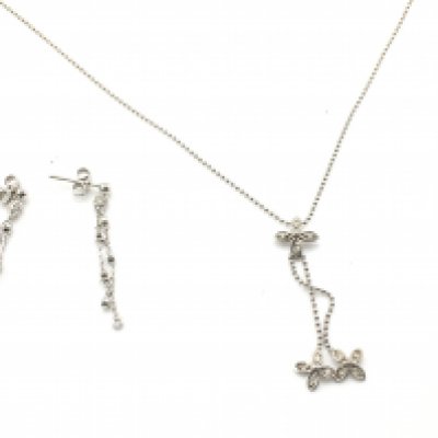 A 9ct white gold set including necklace and earrings. Postage B