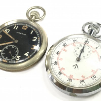 Military issue pocket watch and a Moeris black dial pocket watch. This lot cannot be posted