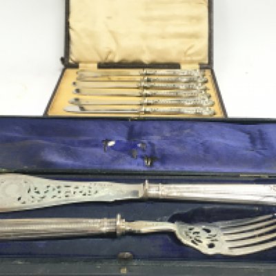 A cased set of silver hallmarked fish servers and a set of knives, postage category C