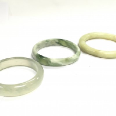 Three Jade bracelets. This lot cannot be posted