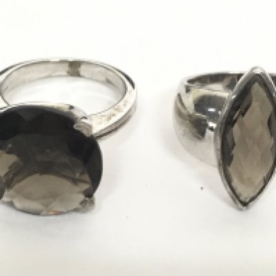 Two silver smokey quartz rings, sizes S & N. postage category A. NO RESERVE