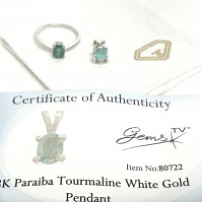 18 carat white gold Paraiba Tourmaline pendant and a silver ring. With Certificate. Postage category A. NO RESERVE