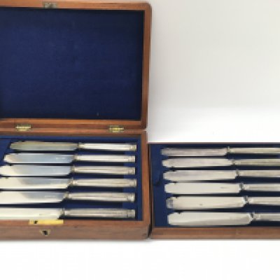 A cased set of silver plated fish knives. Postage B. NO RESERVE