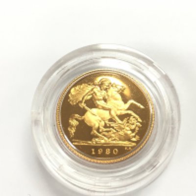 A 1980 proof half sovereign with COA and case.Postage B