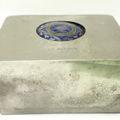 A 1920s S.S. Britannia silver plated cigarette box, with enamel design. Dimensions 9x10x5.5cm postage category B. NO RESERVE