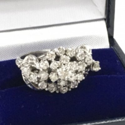 Fancy R/C diamond cluster ring set with R/C diamonds in white metal. Boxed. Diamonds 1.10ct Approx. Ring size Approx O. Postage category A.