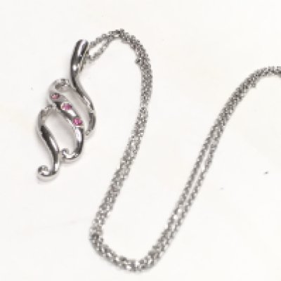 Silver &ldquo;flame&rdquo; pendant set with pink tourmaline on a silver chain. Postage category A.