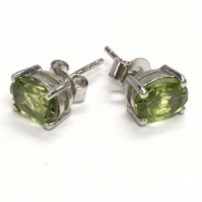 Pair of studs in silver. Postage category A.