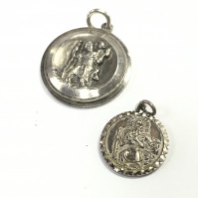 Two silver St Christopher pendants by Georg Jensen