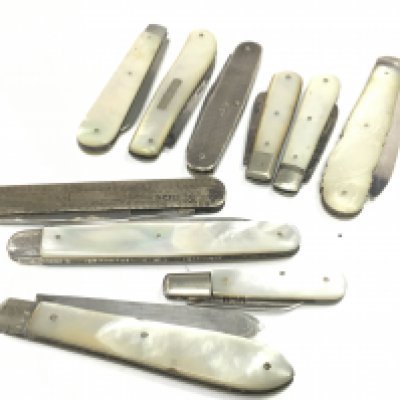 A collection of 10 silver fruit knives and penknives , postage category A