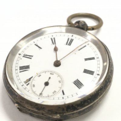 A silver cased pocket watch , seen working