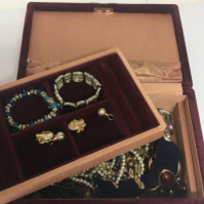 A box containing costume jewellery in a red velvet jewellery box. NO RESERVE