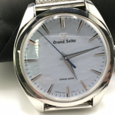 Grand Seiko Spring drive Omiwatari ref SBGY007 stainless steel case is 38.5mm. Original leather strap included. Complete with box and operating instructions and ebay authentication card. Excellent condition.
