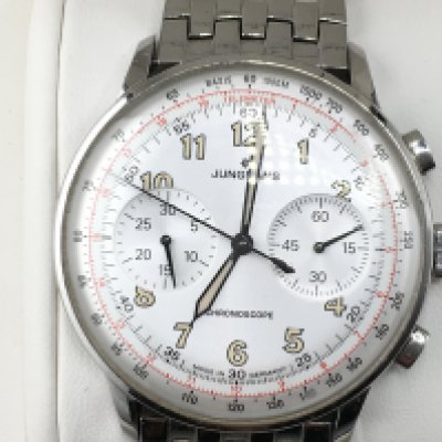 A Junghans Meister Telemeter chronograph automatic watch. Case is steel 40mm. Comes with box and paperwork and original strap. Good condition with slight scuff to face. Seen running. Postage B