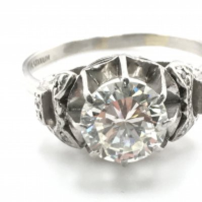 A diamond solitaire platinum ring comes with IDRC certificate. size TPostage B