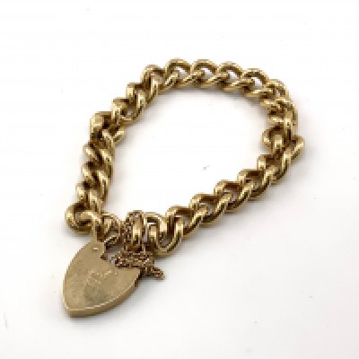 A heavy 9ct gold curb bracelet, total weight 41.7g. (A)