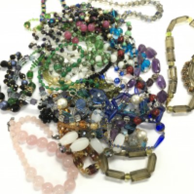 A large collection of assorted beaded jewellery. Postage B