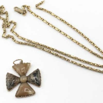 A 9ct gold chain 24.77g & 68cm and a stone pendant. Postage A