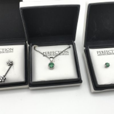 Three boxed items of jewellery made by Perfection. Postage B