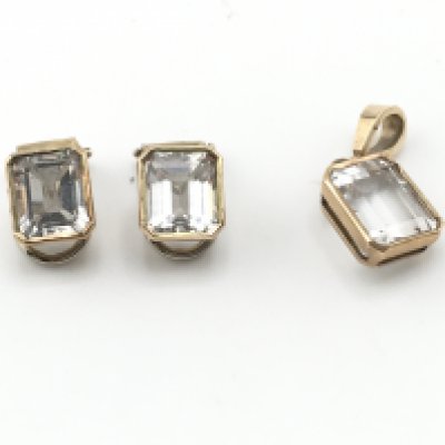 A pair of 9ct gold white stone set clip on earrings and matching pendant. Postage B