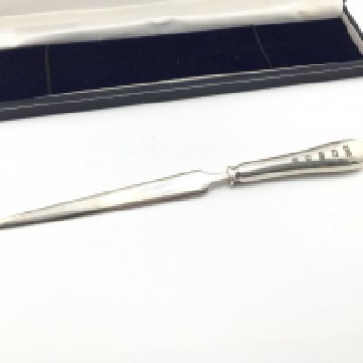 A hallmarked silver letter opener. 44.66g Postage B