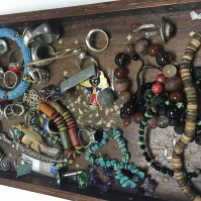 A collection of silver rings and various costume jewellery.