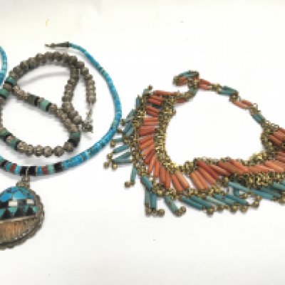 Three necklaces including silver and plated examples decorated with turquoise.