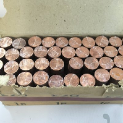 A boxed set of rolled sealed unused 1971 one penny coins. Postage category B