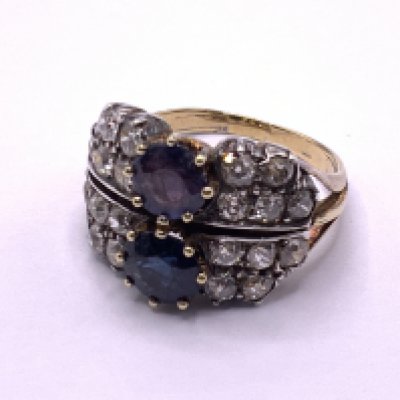 An Unmarked (tested) 18ct gold single sapphire and diamond cluster cocktail ring (Mix of Diamonds and Moissonite etc) (A).
