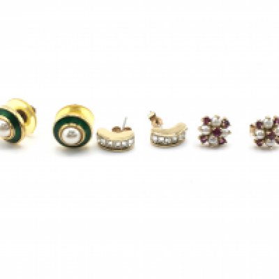 A pair of 9carat gold earrings set with pearl and garnet stones and two other pairs of gold plated dress earrings.