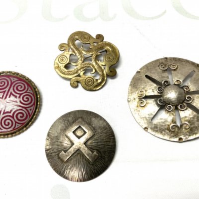 4 Vintage arts and crafts brooches including a Norwegian .800 silver example. (A)