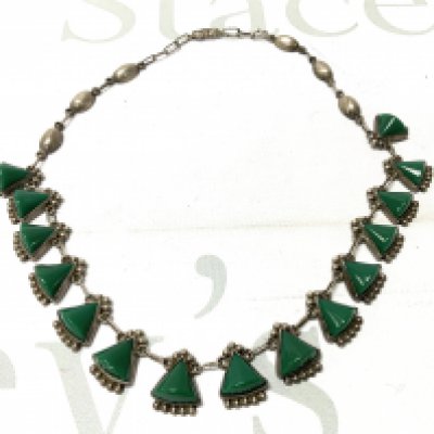 A sterling silver and green stone collerette necklace. (A)