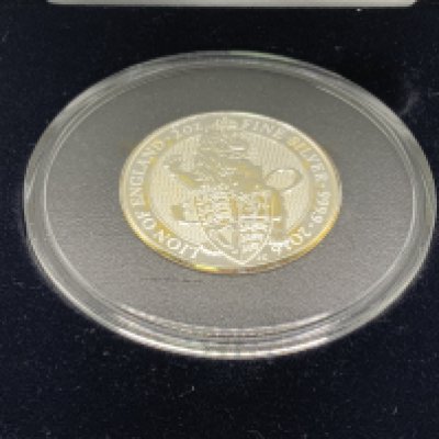 A 2016 Lion of England Queens Beast silver 2 ounce coin. (A)