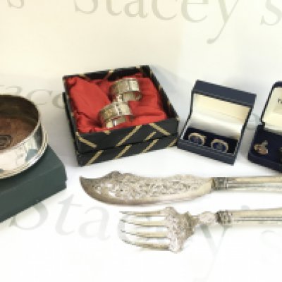 A Collection of silver hallmarked items including a fish knife and fork, cufflinks, napkin rings, dish.postage category B
