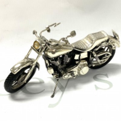 A Medusa-Oreo sterling silver model of a motorbike, 18cm x 8cm. 421g total weight (A)