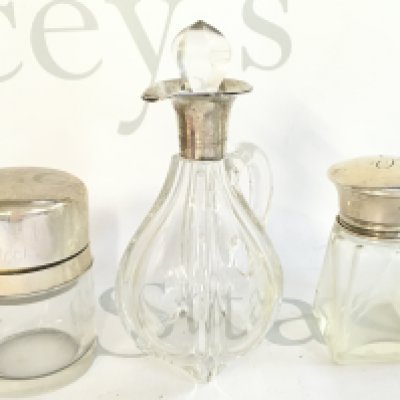 A Collection of silver hallmarked scent bottles, this lot cannot be posted.