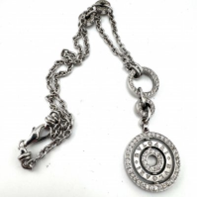 A heavy 18ct white gold necklace in the style of a Bvlgari Cerchi Astrale necklace, unmarked, tested 18ct white gold, inset with a mix of diamonds and white sapphires. Approx 35g (A)