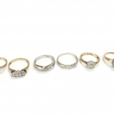 A collection of 6 9ct gold rings set with assorted stones. 14.56g Postage A