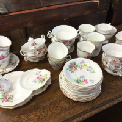 Tea sets Old Country Spray by Queen Anne, Carousel Royal Stafford including saucers, cups etc. this lot cannot be posted