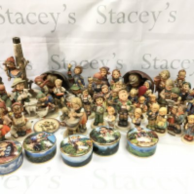 A large collection of porcelain Hummel figures and some Danbury Mint Hummel music boxes. This lot cannot be posted