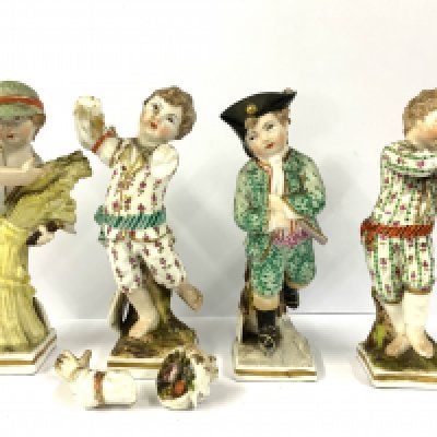 Four early KPM porcelain figures of children depicting months of the year. 10.5cm. NO RESERVE