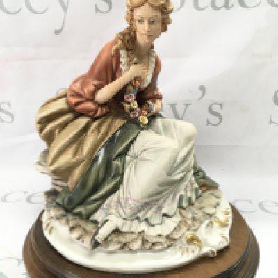 A Capodimonte figure by Raffaello Bedin , 32cm tall. This lot cannot be posted