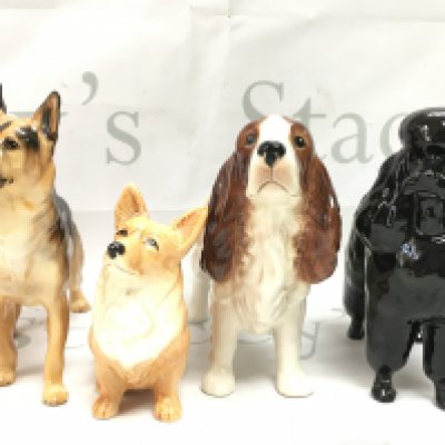 Four porcelain dog figures including Beswick, Sylvac and Royal Doulton. This lot cannot be posted