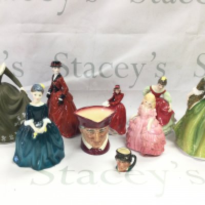 A collection of Royal Doulton and Worcester porcelain figures including Fleur, Cherrie, Fair Maiden, Rose (damaged) and character jugs. This lot cannot be posted