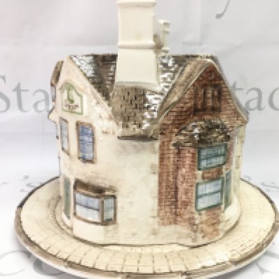 Harrods Bell Inn Stilton cheese dome , made and hand-painted in Staffordshire exclusively for Harrods Knightsbridge, a registered design of The London Pottery company . 23cm tall. This lot cannot be posted